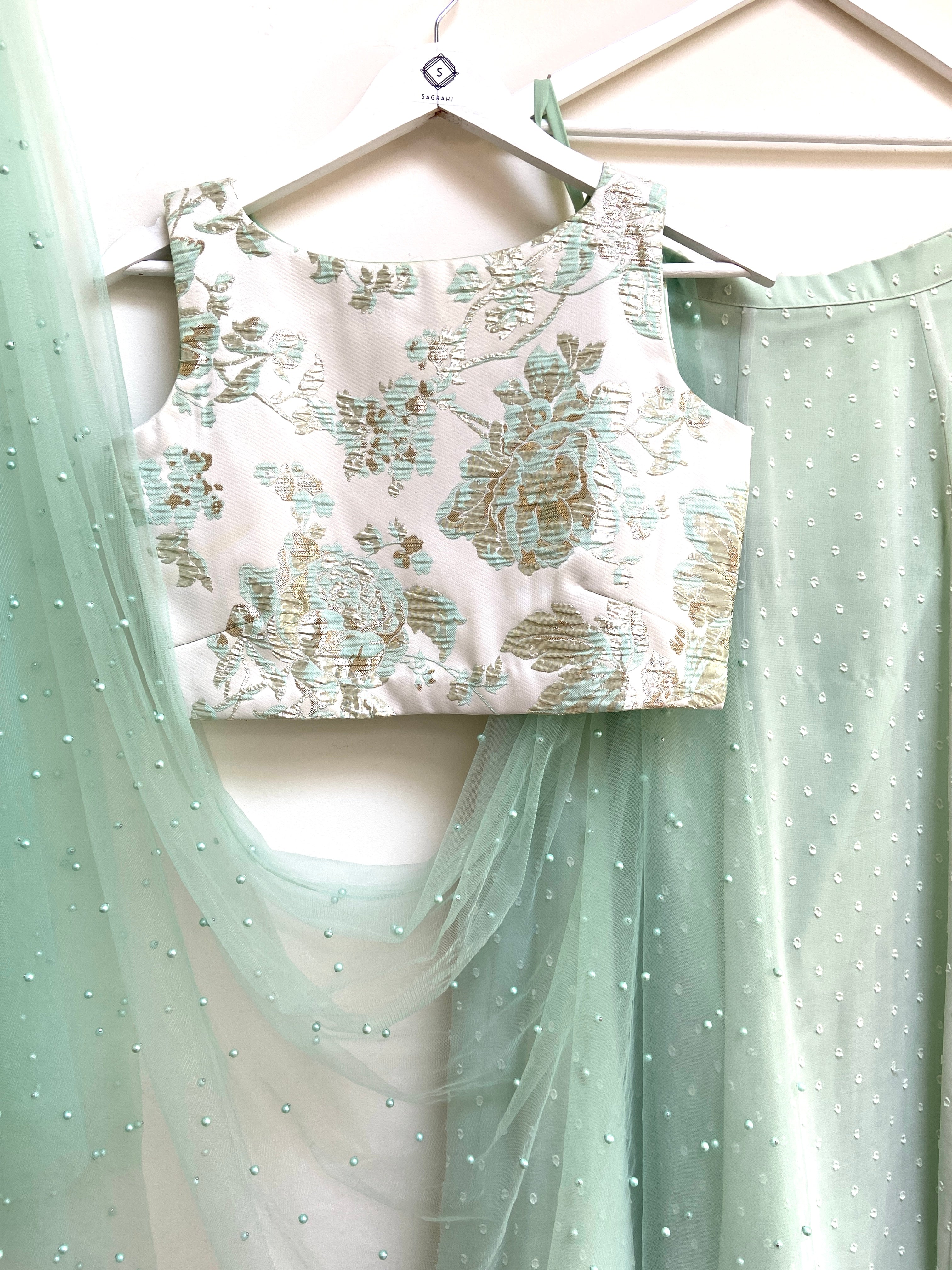 Green dobby skirt with Jacquard cross back top and choice of dupatta