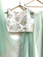 Green dobby skirt with Jacquard cross back top and choice of dupatta