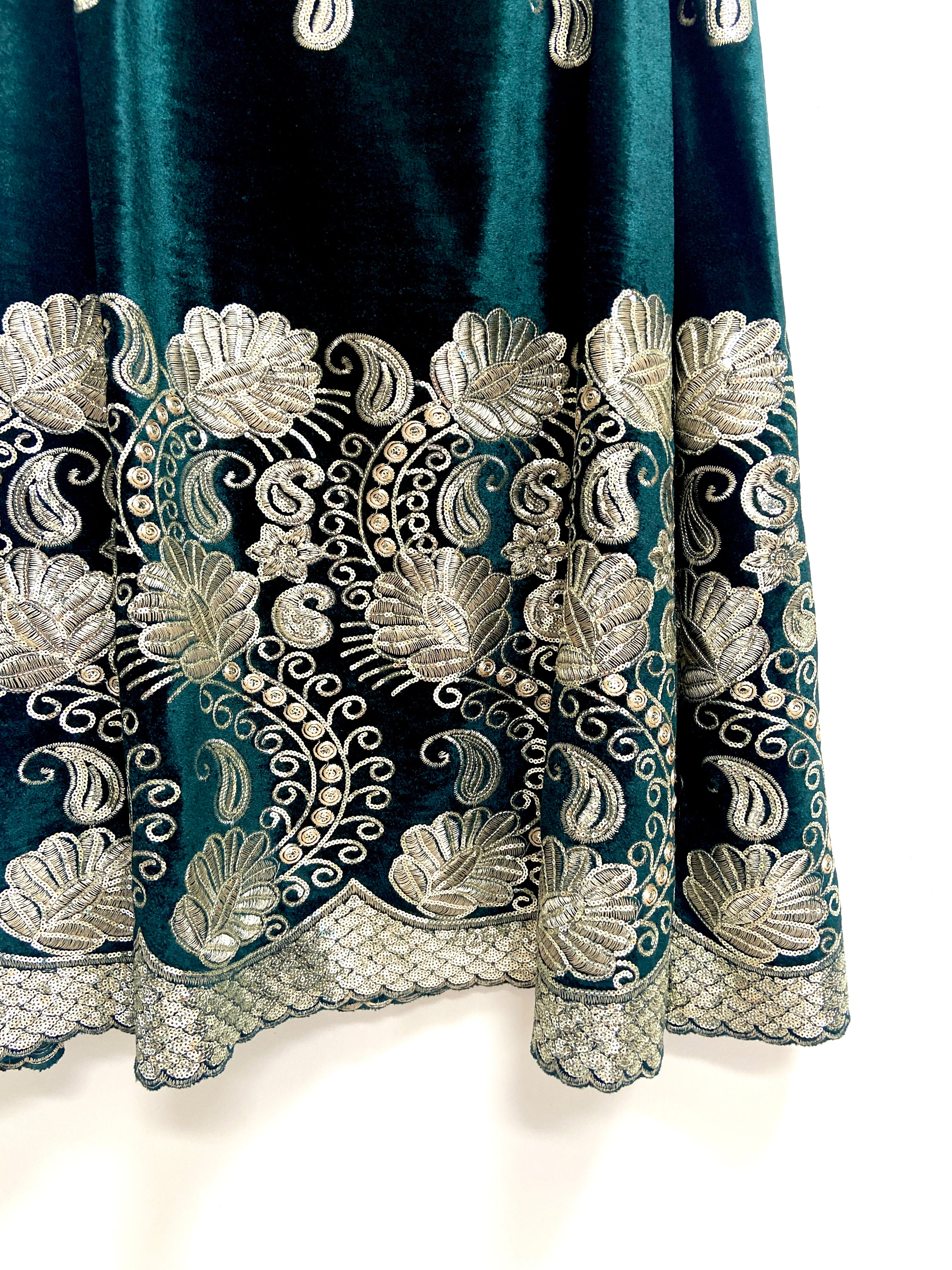 Ambi green and gold velvet lehenga set