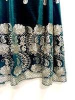 Ambi green and gold velvet lehenga set