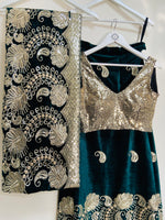 Ambi green and gold velvet lehenga set