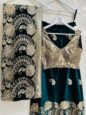 Ambi green and gold velvet lehenga set