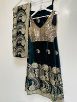 Ambi green and gold velvet lehenga set