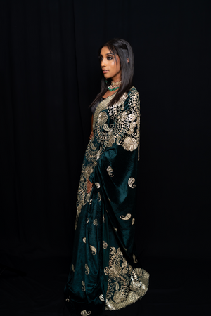 Ambi green and gold velvet lehenga set